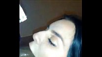 On her knees sucking black cock